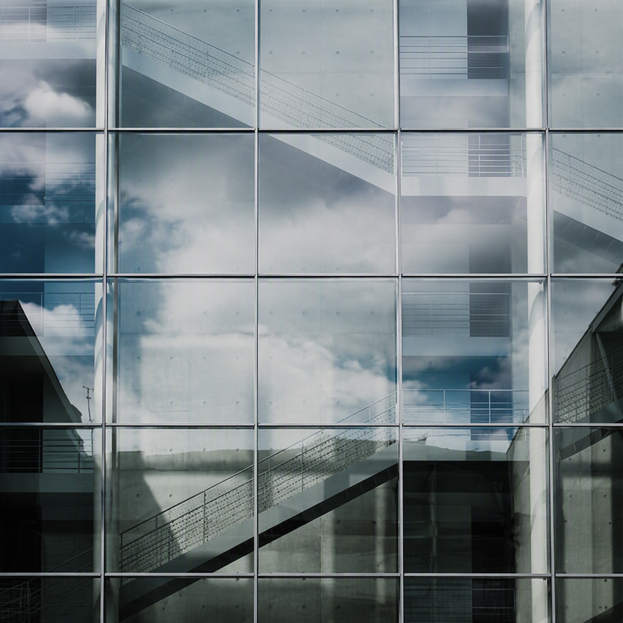 Multi-country conglomerate glass building